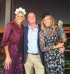 On stage with Olympic swimmer Shayna Jack and Tony Gollan at the launch of the 2025 Stradbroke Season ... holding Jack's Olympic Gold medal