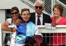 Luke Tarrant with Melanie and Frank Phillips and Helen Page after Rudy had won the Listed Recognition Stakes at Doomben