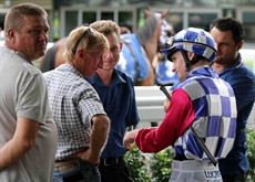 Connections of Diamond Trail confer before the mare goes out to land a highly creditable second placing behind the useful Tiger Dimejan at Doomben on January 21 (see below)