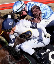 Jimmy Orman ... trying to keep Jim Byrne at bay in the Brisbane Jockeys' Premiership

Photo: Graham Potter