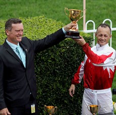 David Vandyke and Damian Browne show off the Ipswich Cup after Maurus's runaway victory