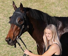 Sally Taylor ... enjoying her Grafton Cup win with Rednav 