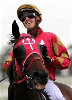 A smile for the camera. 
Happy horse, happy rider