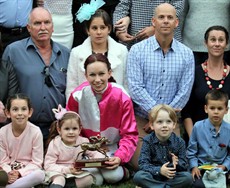 Happy ... surrounded by the Duncan family in the presentation photograph

