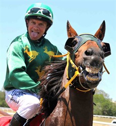 Just happy to be back on a horse going out onto the track (the horse seems pretty happy to have him back as well)