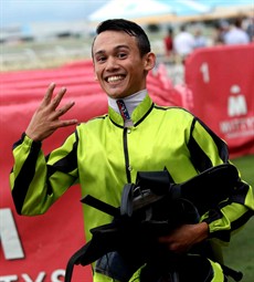 Matthew McGillivray ... celebrating four winners at Doomben on Saturday
