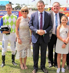 Chief Minister Michael Gunner and the Simone Montgomery family and Carl Spry, who rode two winners on Cup Day