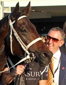 Oh so familiar scenes …
Peter Tighe with Winx in the winners' enclosure