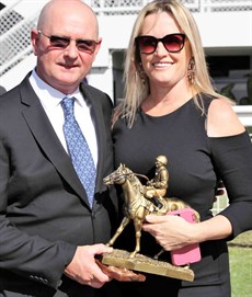 Acqume (11) is all the rage in race 8.
She generally is ridden mid field and makes a run over the final 200 metres. I am just not too sure that $2 is a reasonable price! So, I am going to give her the WINNO thumbs down – you know that Toby Edmonds (pictured above with his wife) is probably cheering now and she will come out and win by 4 lengths ...