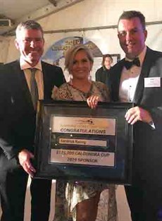 Stuart and Trudy Kendrick pictured with the Sunshine Coast Turf Club CEO John Miller after Kendrick Racing had won the naming rights to the 2019 Caloundra Cup