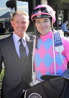 Jake Bayliss and his father Jamie (pictured above).

Polemic (11) is ridden by a true Queenslander - Jake Bayliss and trained by a fine NSW trainer – Stephen Lee - at Ballina. This gelding is at his fourth run into this preparation and I think he may be ready to show up here this weekend. Last start he peaked on his run at the 100 metres over the mile – this weekend back to 1500 metres maybe he will be ready to win this race. Jake has settled in Brisbane and rode a winner last weekend – maybe we should follow him. (see race 7)