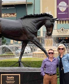 With the statue of Zenyatta at Santa Anita