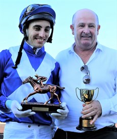 Mallyon with Mel Eggleston on the presentation podium after guiding Miss Fabulass to an exhilarating come from behind feature race victory at Doomben last Saturday