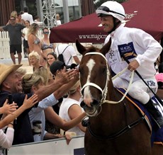 … where I received a high five from Magic Millions El Supremo's Gerry Harvey and Katie Page and so many other racing fans

Nobody knew it at the time, but it would be the last time I sat on a horse