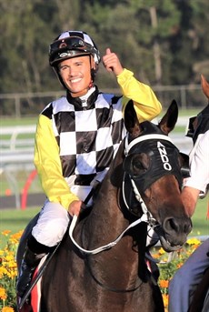 Matty McGillivray brings the feature race winner Ballistic Boy back to scale at the Sunshine Coast