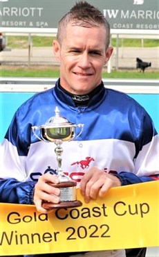 Du Plessis on the presentation podium after his win on Stardome (pictured below) in the Gold Coast Cup