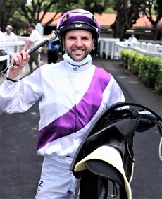 Good times ... Larry Cassidy saluting another Go Wandji win