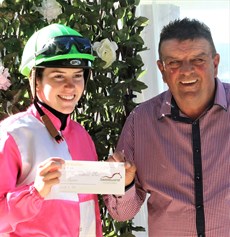 Cornish receives her prize as the winner of the 2021/22 Gatton Jockey's Premiership