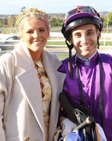 Maddy Sears and Adelad's winning jockey Andrew Mallyon ... who is pictured below driving Adelad to victory 