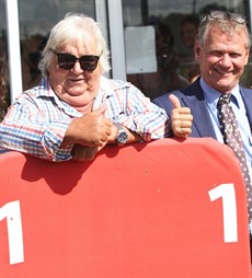 Mishani Enterprises Mike Crooks and trainer Les Ross ... looking to be in the winner's enclosure at Rockhampton ... 